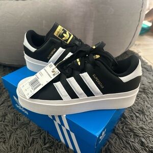 Adidas Super Stars platform sneakers